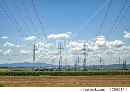 electrical towers and power lines. electrical towers and power lines. 67690154