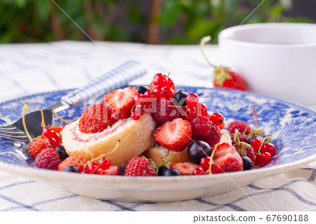 dessert with fresh berries in a blue vintage dessert with fresh berries in a blue vintage 67690188