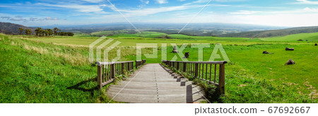 It is a vast landscape of Naitai Kogen Ranch in Kamishihoro Town, Hokkaido. It is a vast landscape of Naitai Kogen Ranch in Kamishihoro Town, Hokkaido. 67692667