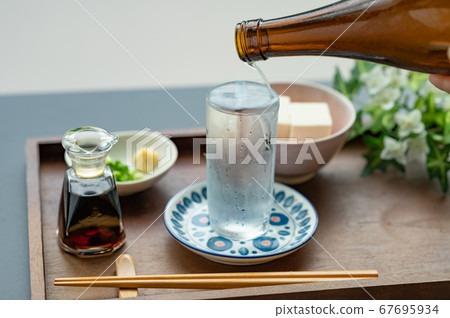Sake chilled in a cup 67695934