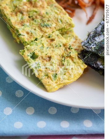 Korean side dishes: seaweed, rolled eggs, kimchi, and shredded squid 67705677