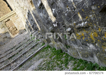 Carcassonne Castle cobblestones and stairs 67706574