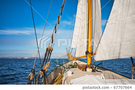 Old schooner sailing along the coast of Rugen Old schooner sailing along the coast of Rugen 67707664