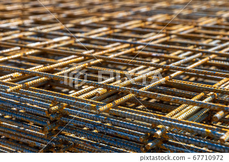 iron lattice for the foundation of a family house 67710972