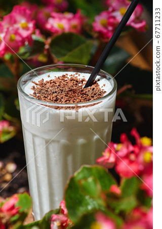 Milk shake with chocolate cookies on the summer Milk shake with chocolate cookies on the summer 67711233