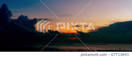 Beautiful cloudscape. Sunset sky over sea at tide. 67713643