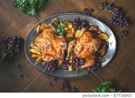 Oven roasted chicken served with baked potato 67716003