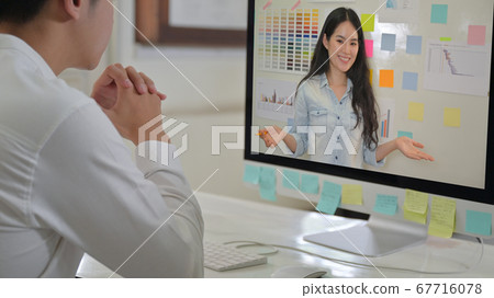 Professional male and female designers meeting Professional male and female designers meeting 67716078