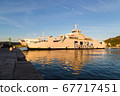 Reflections of the local car ferry 67717451