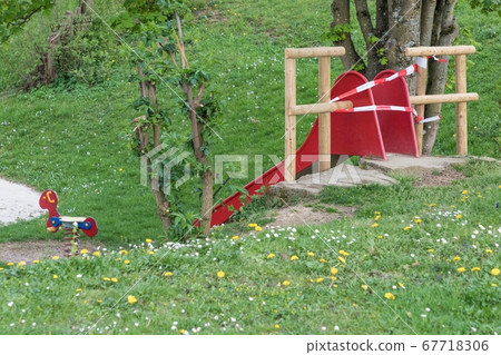 Corona virus quarantine lockdown playground slide Corona virus quarantine lockdown playground slide 67718306