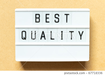 Lightbox with word best quality on wood background Lightbox with word best quality on wood background 67718336