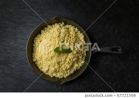 Couscous is a fine pasta from North Africa Couscous is a fine pasta from North Africa 67721509