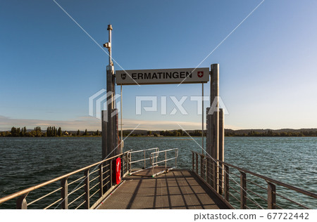 Pier at Ermatingen. Reichenau Island in the background. Lake Constance, Switzerland 67722442