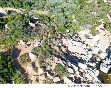 Aerial view of Los Penasquitos Canyon Preserve with the creek waterfall, San Diego 67722955