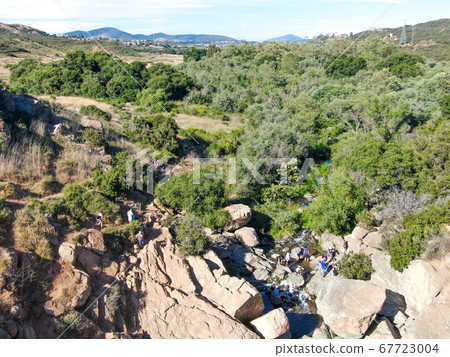 Aerial view of Los Penasquitos Canyon Preserve with the creek waterfall, San Diego 67723004