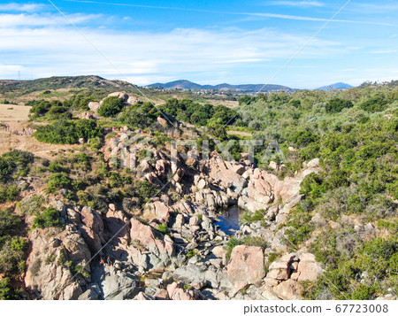 Aerial view of Los Penasquitos Canyon Preserve with the creek waterfall, San Diego 67723008