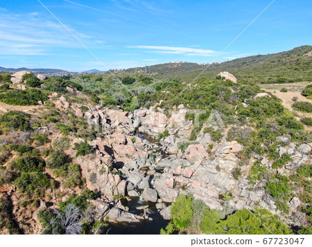 Aerial view of Los Penasquitos Canyon Preserve with the creek waterfall, San Diego Aerial view of Los Penasquitos Canyon Preserve with the creek waterfall, San Diego 67723047