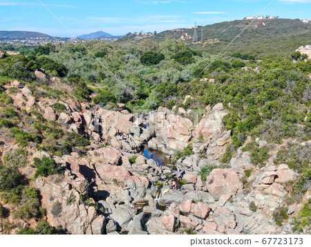 Aerial view of Los Penasquitos Canyon Preserve with the creek waterfall, San Diego 67723173