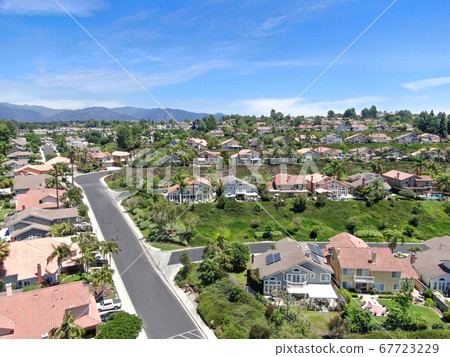 Aerial view of master-planned private communities with big villas with swimming pool, Mission Viejo. 67723229