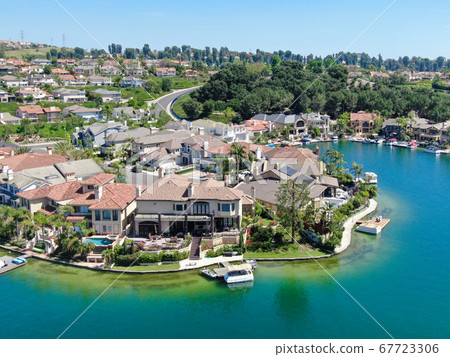 Aerial view of Lake Mission Viejo with private residential and condominium communities. California 67723306