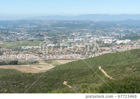 Aerial view of upper middle class neighborhood around Double Peak Park in San Marcos 67723468