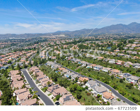 Aerial view of master-planned private communities with big villas with swimming pool, Mission Viejo. 67723509
