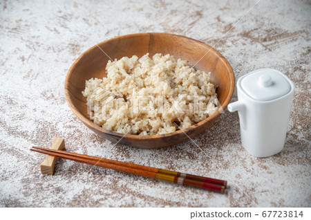 japanese brown rice in wooden bowl with soy sauce japanese brown rice in wooden bowl with soy sauce 67723814