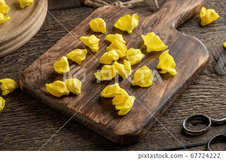 Fresh mullein flowers on a cutting board 67724222