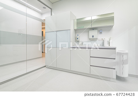 White medical furniture in dentistry office White medical furniture in dentistry office 67724428