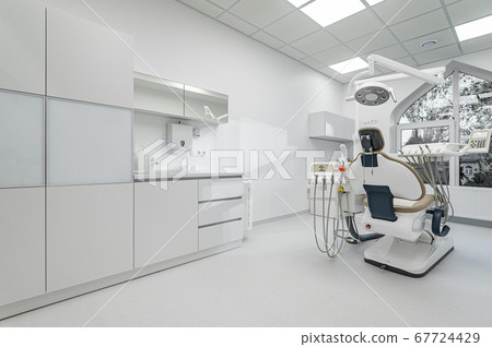 Interior of dental surgery room with special equipment Interior of dental surgery room with special equipment 67724429