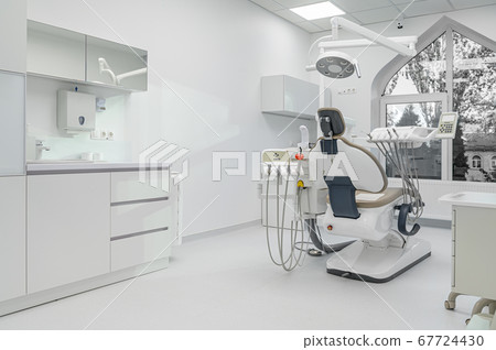 Interior of dental surgery room with special equipment 67724430
