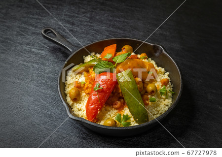 Moroccan clay pot with Tajine pot and North African food 67727978