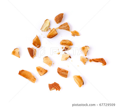 Pieces of almonds on white background 67729509
