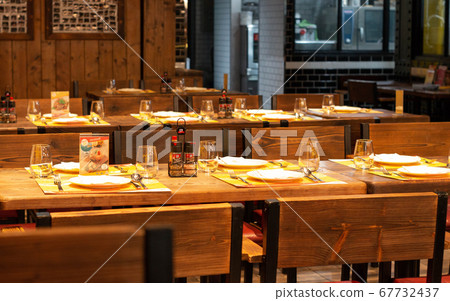 dinner table set in restaurant at night dinner table set in restaurant at night 67732437