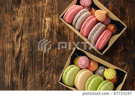 Colorful macaron cookies in a cardboard box Colorful macaron cookies in a cardboard box 67733247