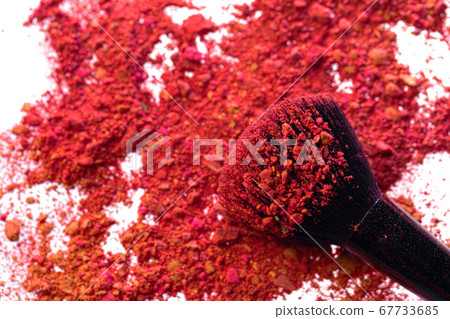 Broken scattered mix of eye shadows with make-up brush Broken scattered mix of eye shadows with make-up brush 67733685