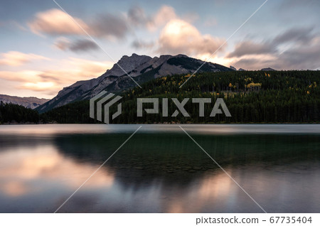 Castle mountain reflection on Two Jack Lake in 67735404