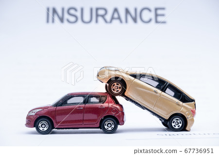 Car placed on insurance documents. Car insurance concept Car placed on insurance documents. Car insurance concept 67736951