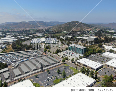 Aerial view to industrial zone and company office, storage warehouse, California Aerial view to industrial zone and company office, storage warehouse, California 67737939