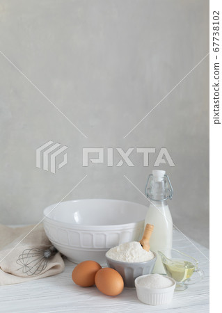 Ingredients for bakery butter flour, milk, oil, eggs, sugar, kitchen accessories 67738102