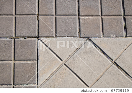 sidewalk tile regular colors and geometric shapes 67739119