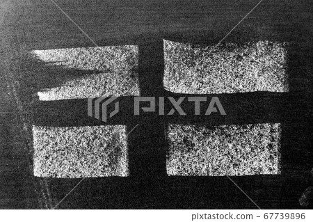 White color chalk hand drawing in set of line or  square shape on black board background 67739896