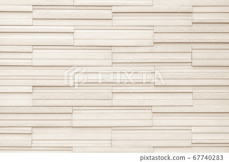Granite tiled wall detailed pattern texture background in natural light beige brown. 67740283