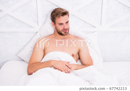 Perfect rest. Man handsome guy relax in bed. Get Perfect rest. Man handsome guy relax in bed. Get 67742213