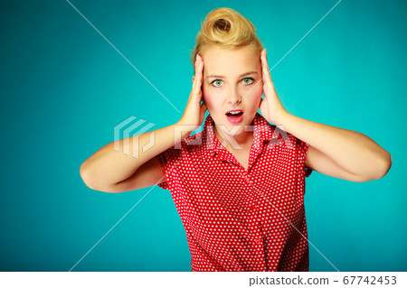 Shocked lovely pin up young girl 67742453