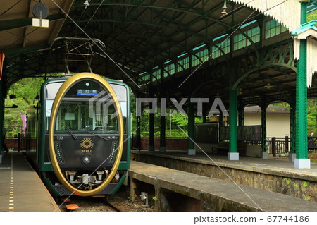 Kyoto Eizan Electric Railway Yase-Hieizanguchi Station and the Eizan Electric Railway's tourist train "Hiei" with its distinctive oval design Kyoto Eizan Electric Railway Yase-Hieizanguchi Station and the Eizan Electric Railway's tourist train "Hiei" with its distinctive oval design 67744186