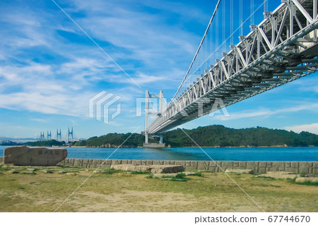 Seto Bridge (Shimotsui Seto Bridge) that crosses the Seto Inland Sea in the blue sky Seto Bridge (Shimotsui Seto Bridge) that crosses the Seto Inland Sea in the blue sky 67744670