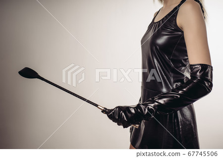 Sexy Lady Holding Strict Leather Short Handle Wide 67745506