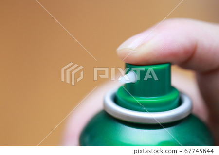 Senior finger spraying a spray can Senior finger spraying a spray can 67745644