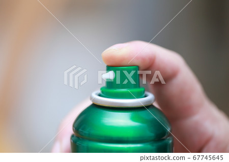 Senior finger spraying a spray can 67745645